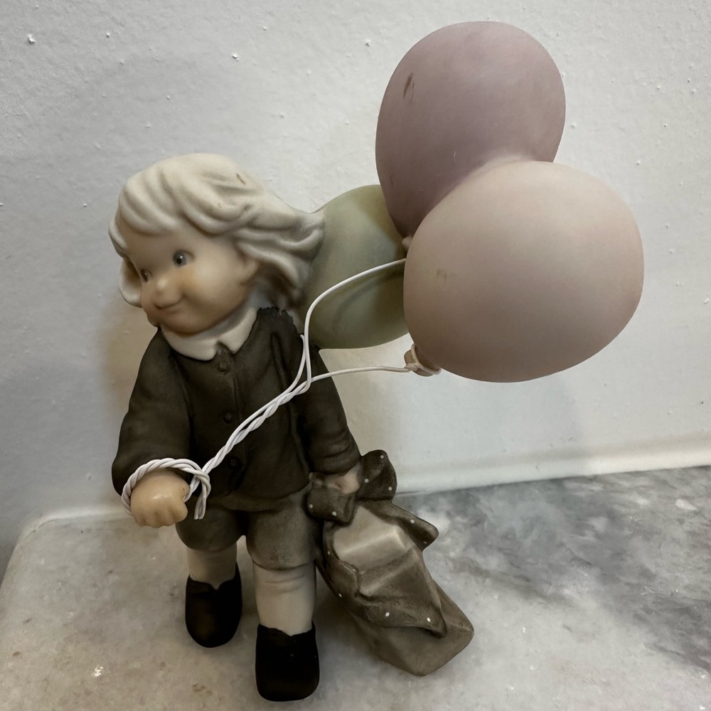 Vintage Enesco Ceramic Figurine Child Holding Ballon’s & Gift Bag